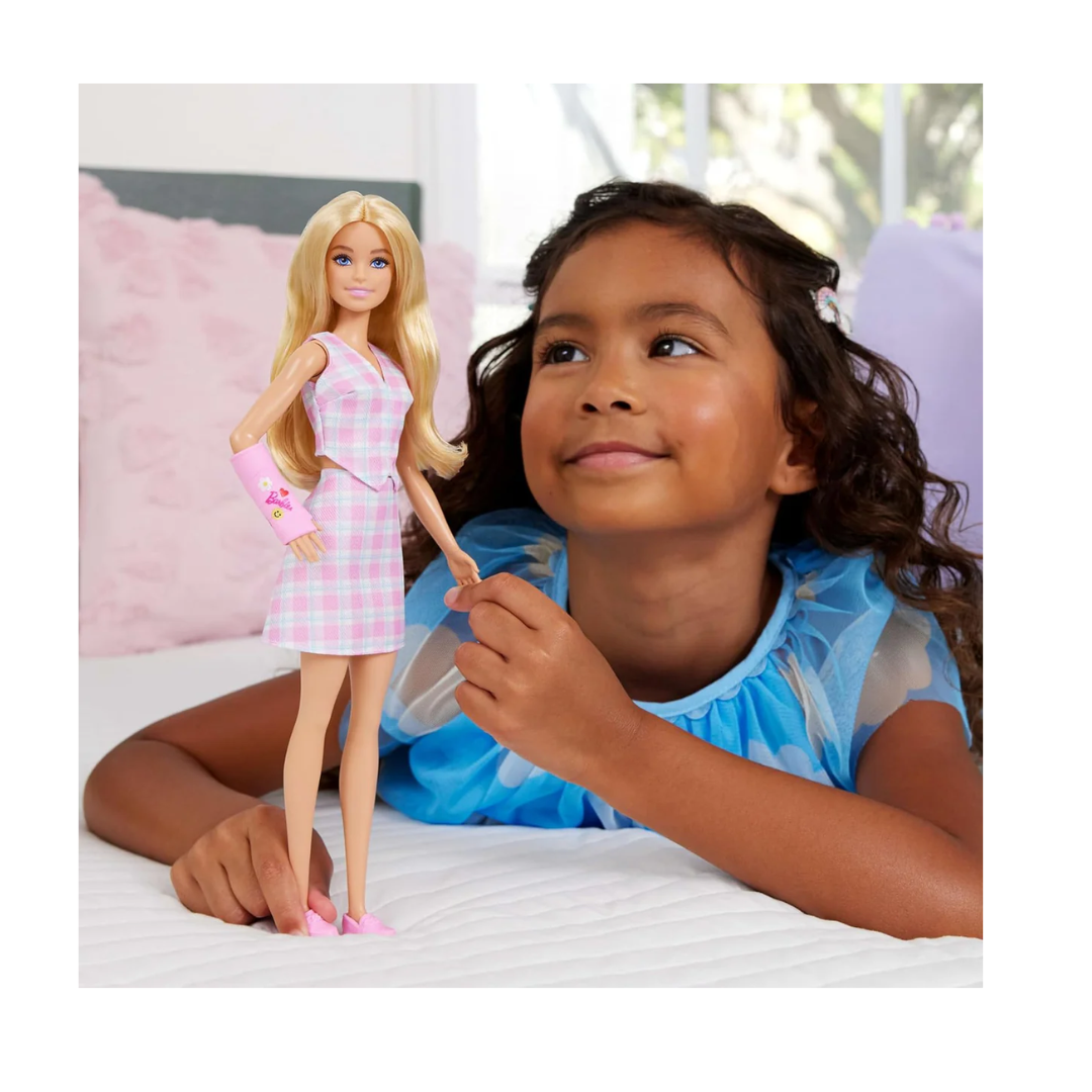 Barbie Fashionistas Doll #243 with Blonde Hair and Plaster Arm Accessories in Pink with a Checked Top and Checked Skirt and Pink Loafers JJN56